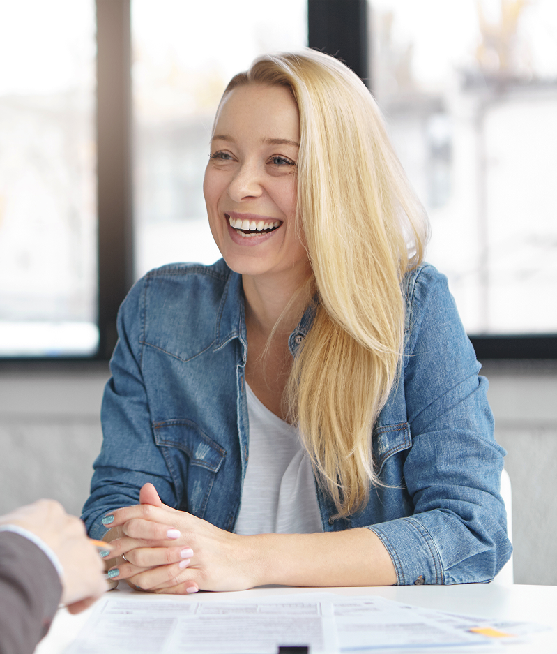 happy-blonde-female-manager-has-conversation-with-male-colleague 1 happy-blonde-female-manager-has-conversation-with-male-colleague 1